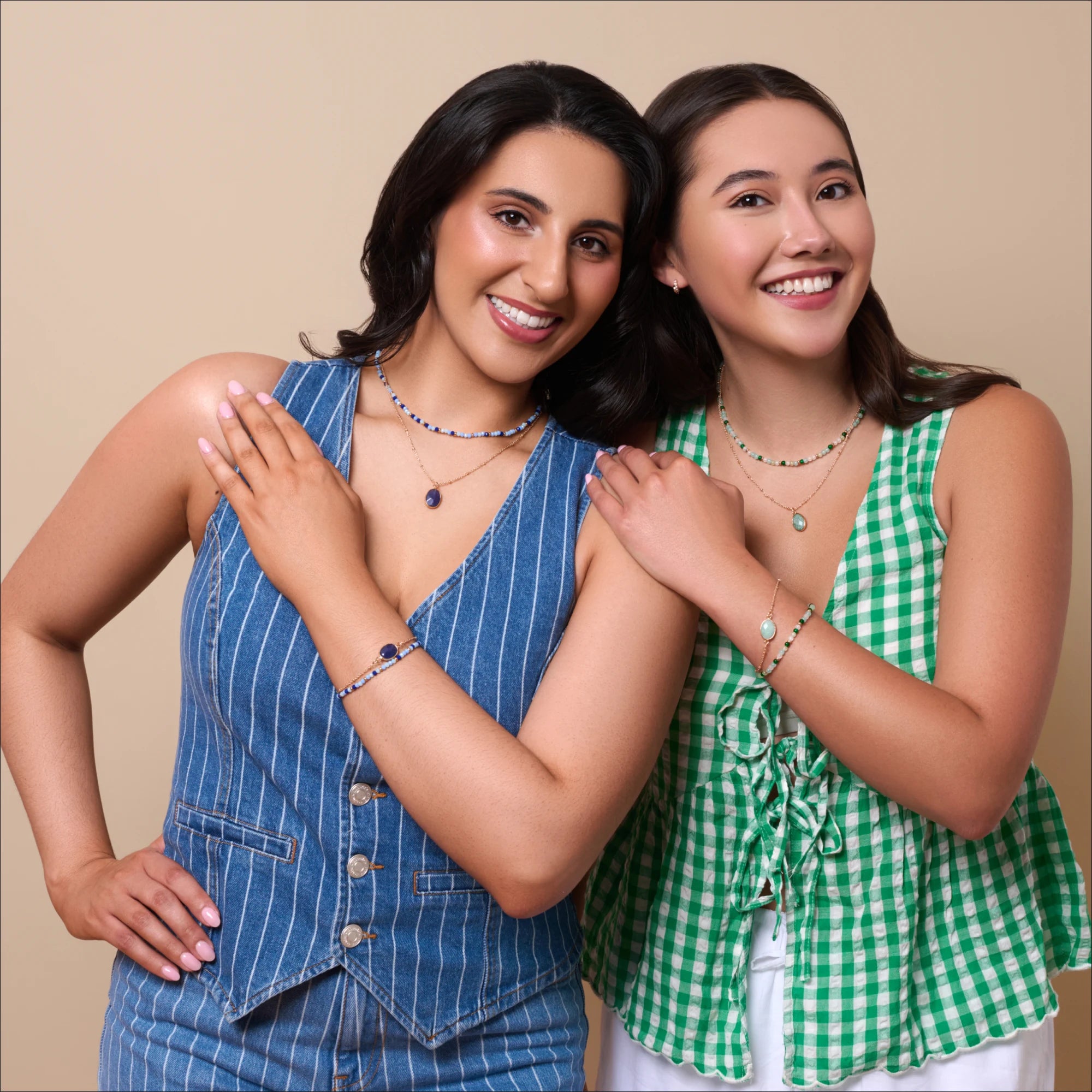 female-models-wearing-beaded-necklace-bracelet-set