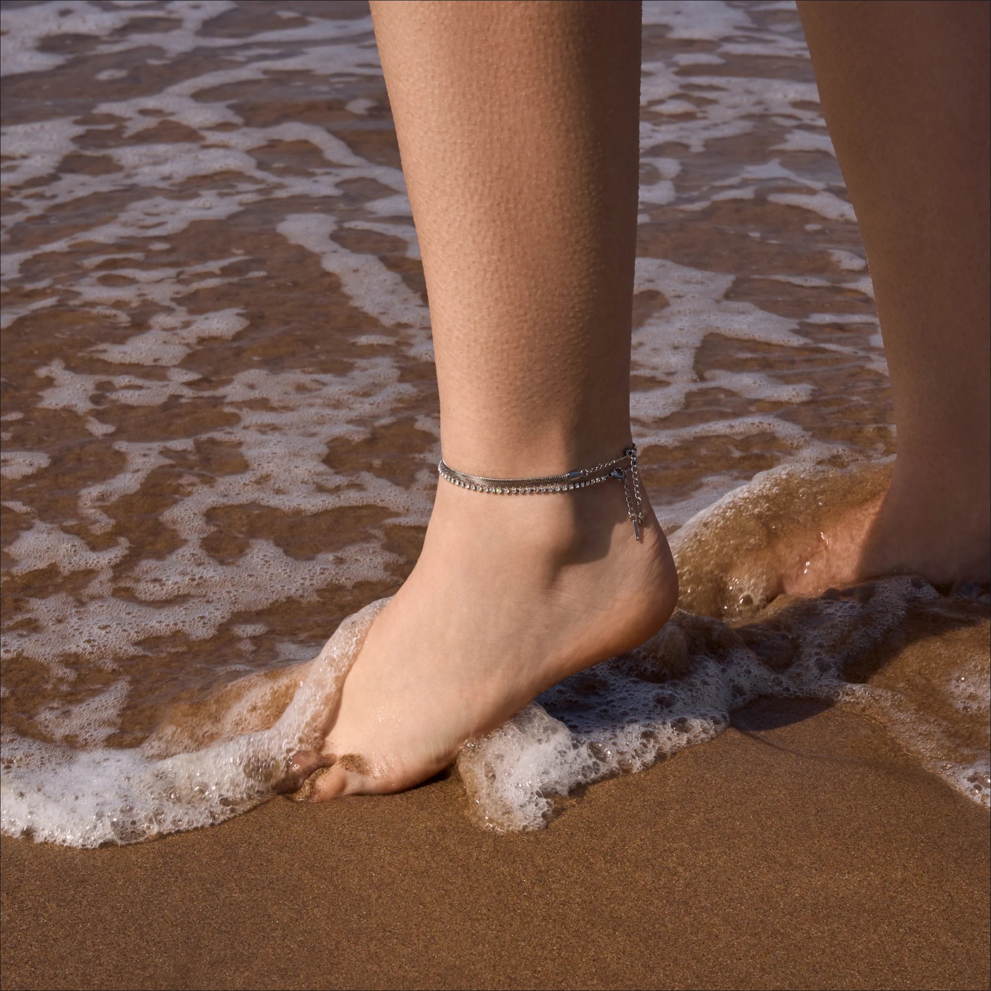 female-model-wearing-stainless-steel-waterproof-silver-double-rope-snake-anklet