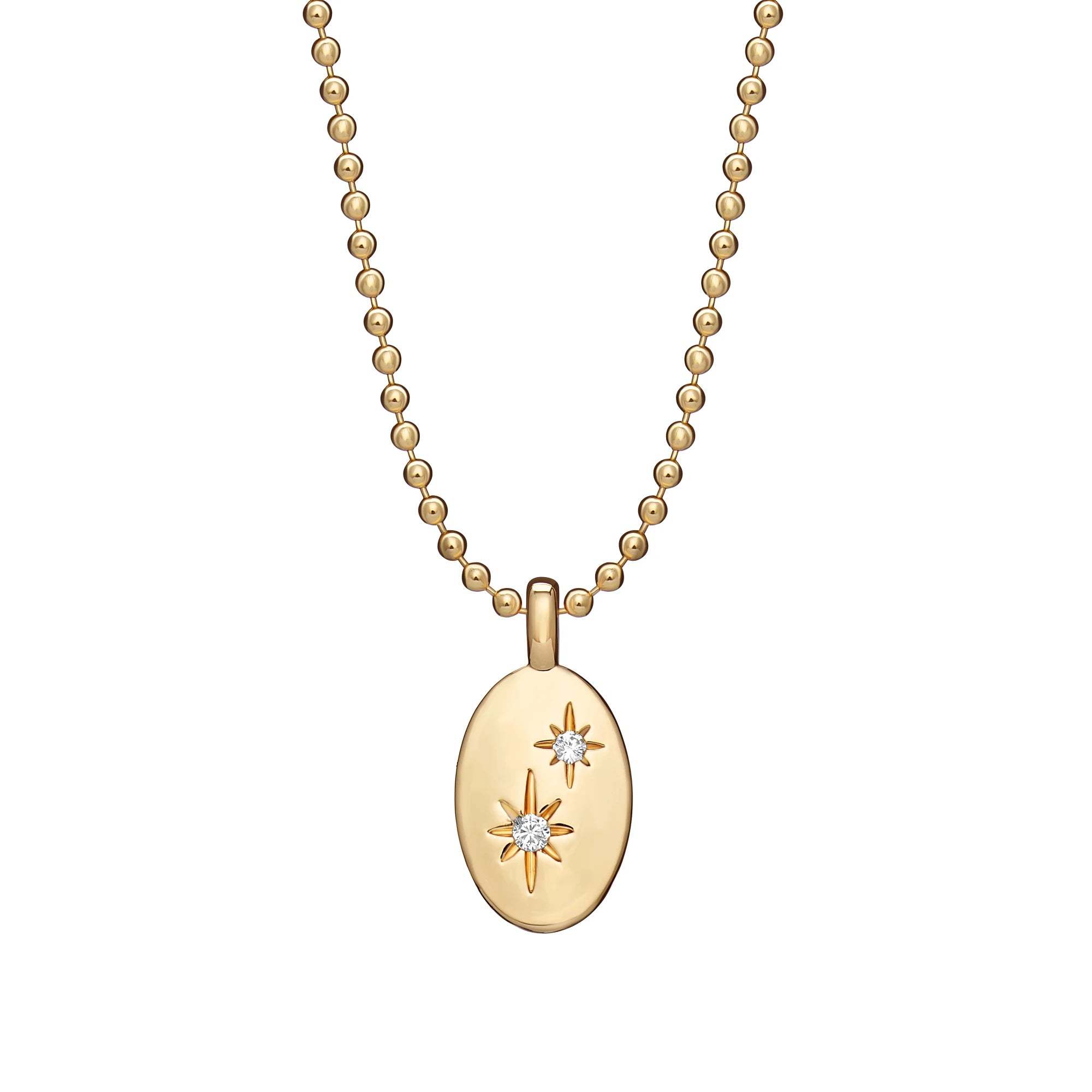 Gold necklace with a pendant featuring star designs on a white background
