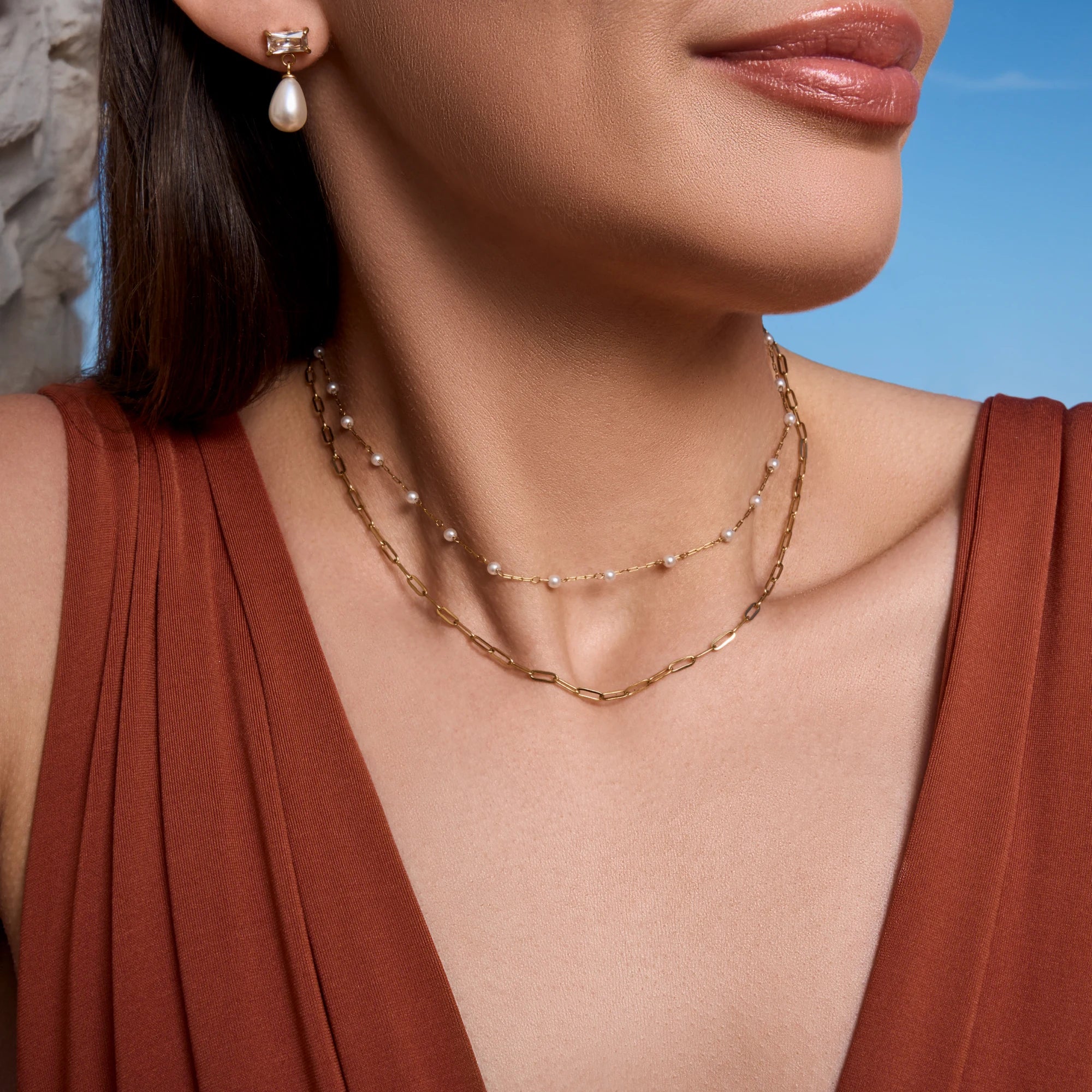 stainless-steel-waterproof-gold-double-pearl-necklace-close-up-on-model