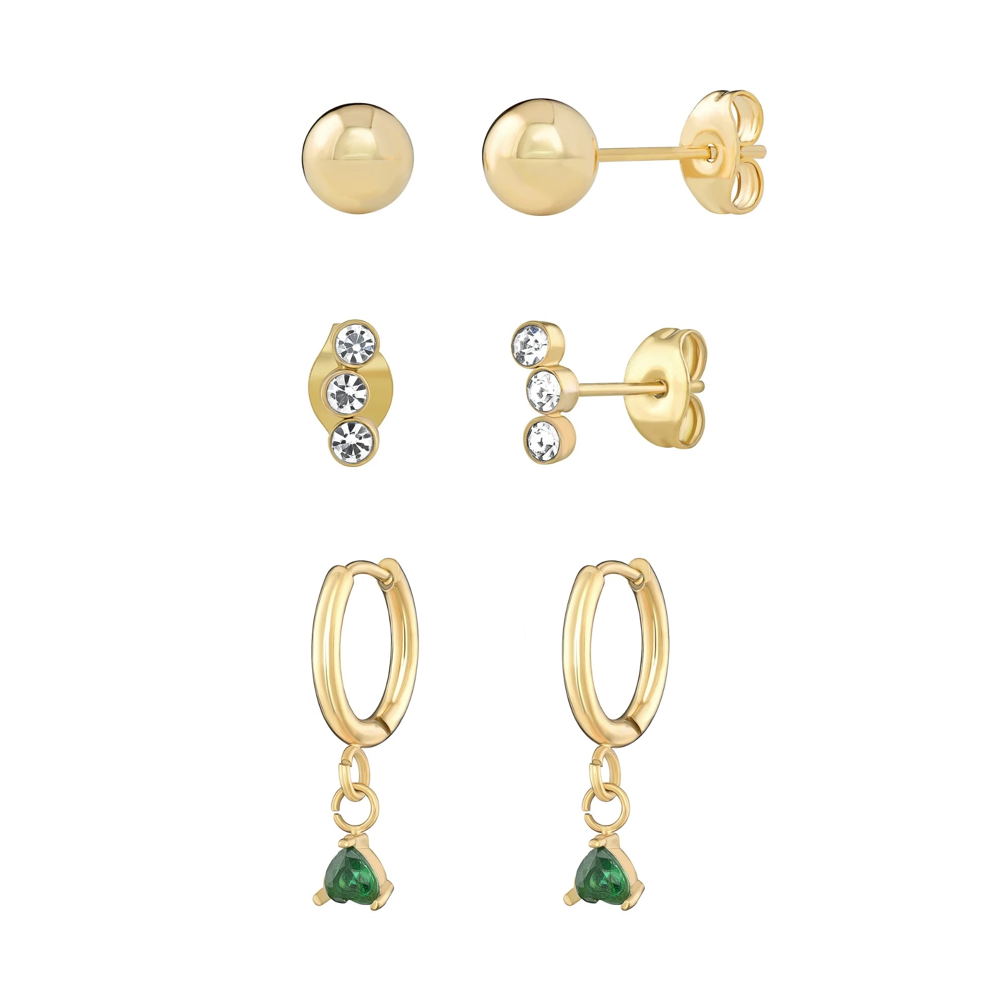 Set of gold earrings with gemstones on a white background