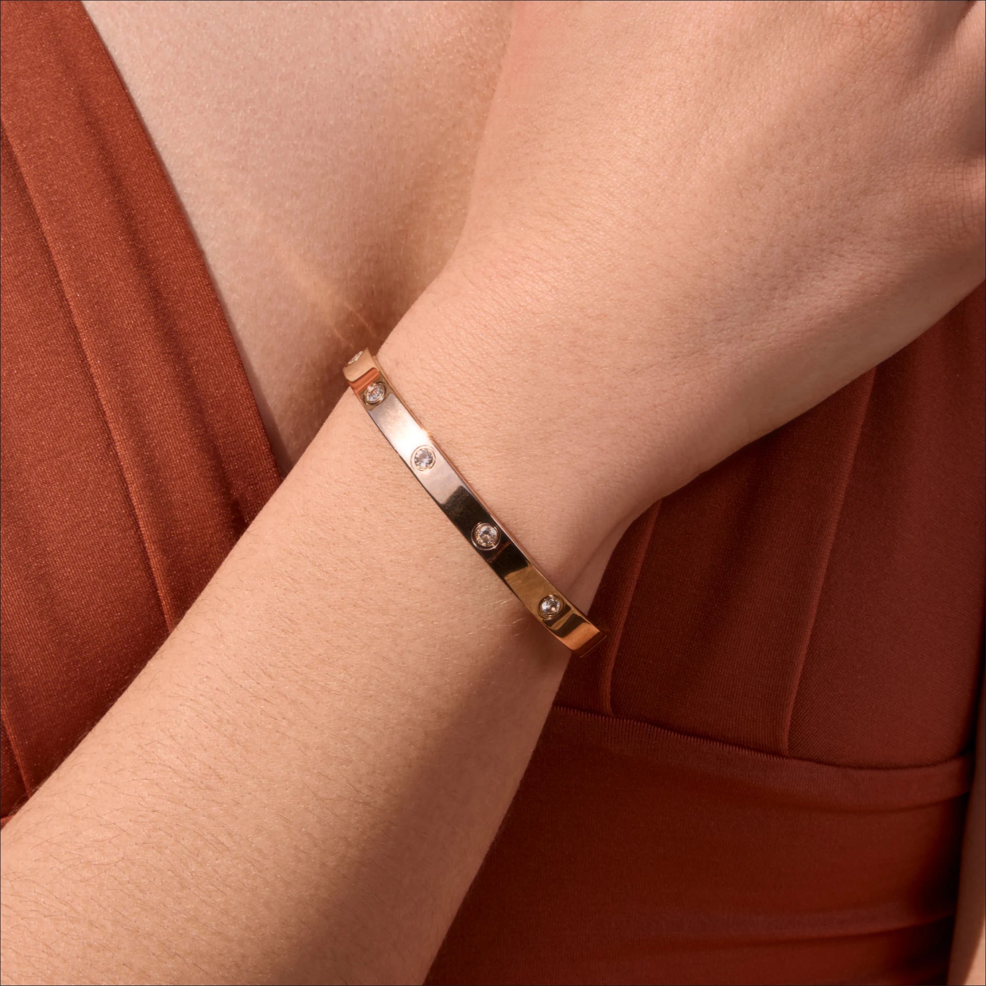 stainless-steel-waterproof-rose-gold-cz-bangle-close-up-on-model