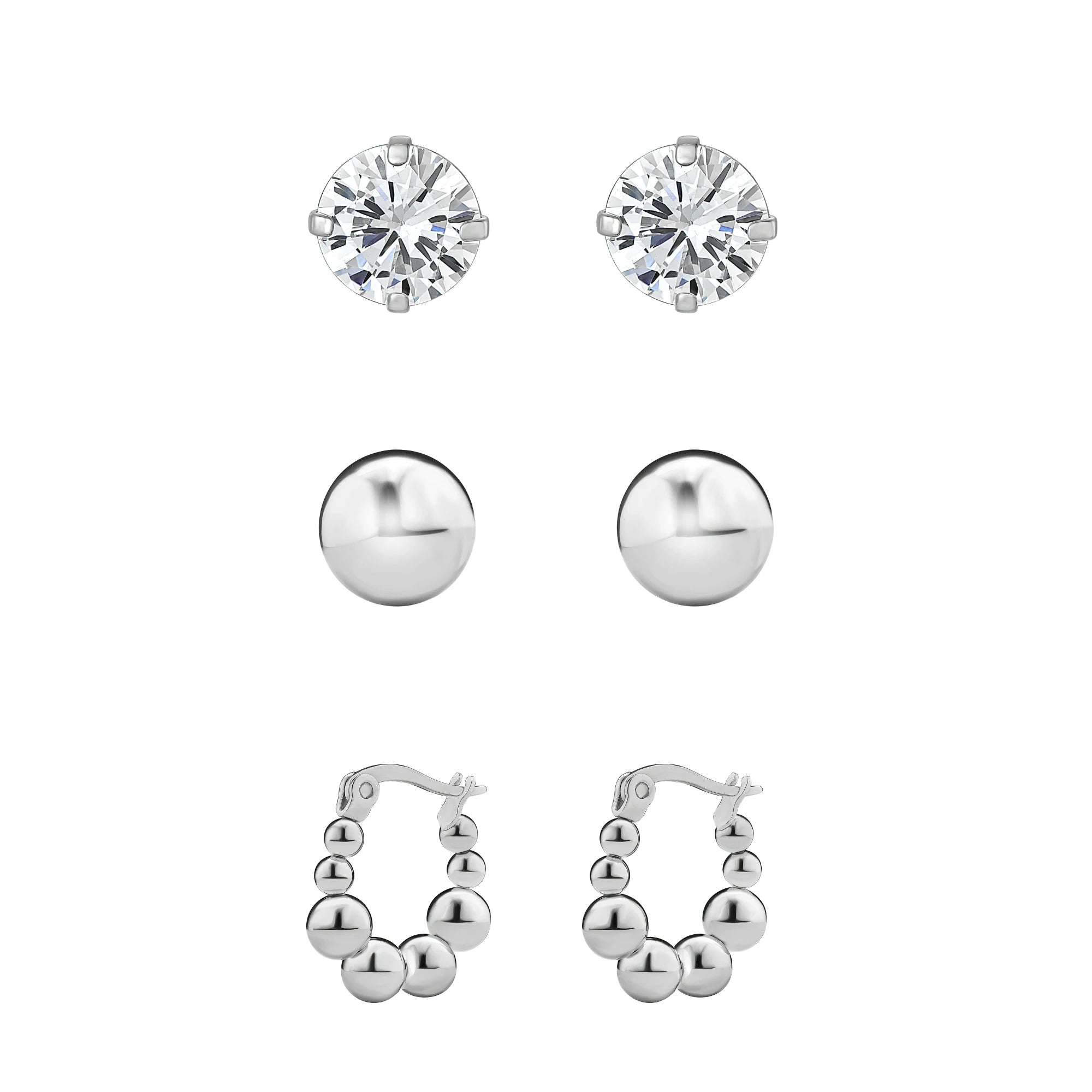 Set of silver earrings including round stud, ball stud, and bubble hoop designs on a white background.